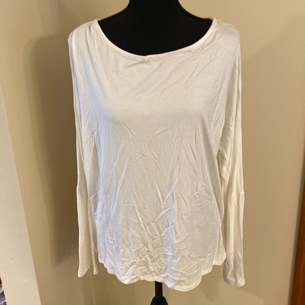 Ariela cream top long sleeve tunic style. Size L. Lacing is back of this top!